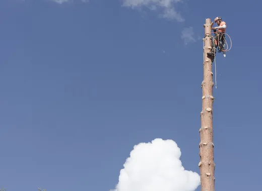 Telecoms installer working with equipment